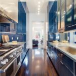 modern design kitchen with mirror backsplash