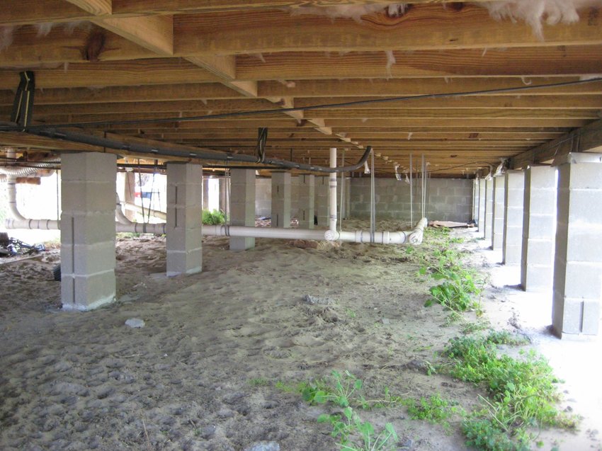 open crawlspace with cement slabs